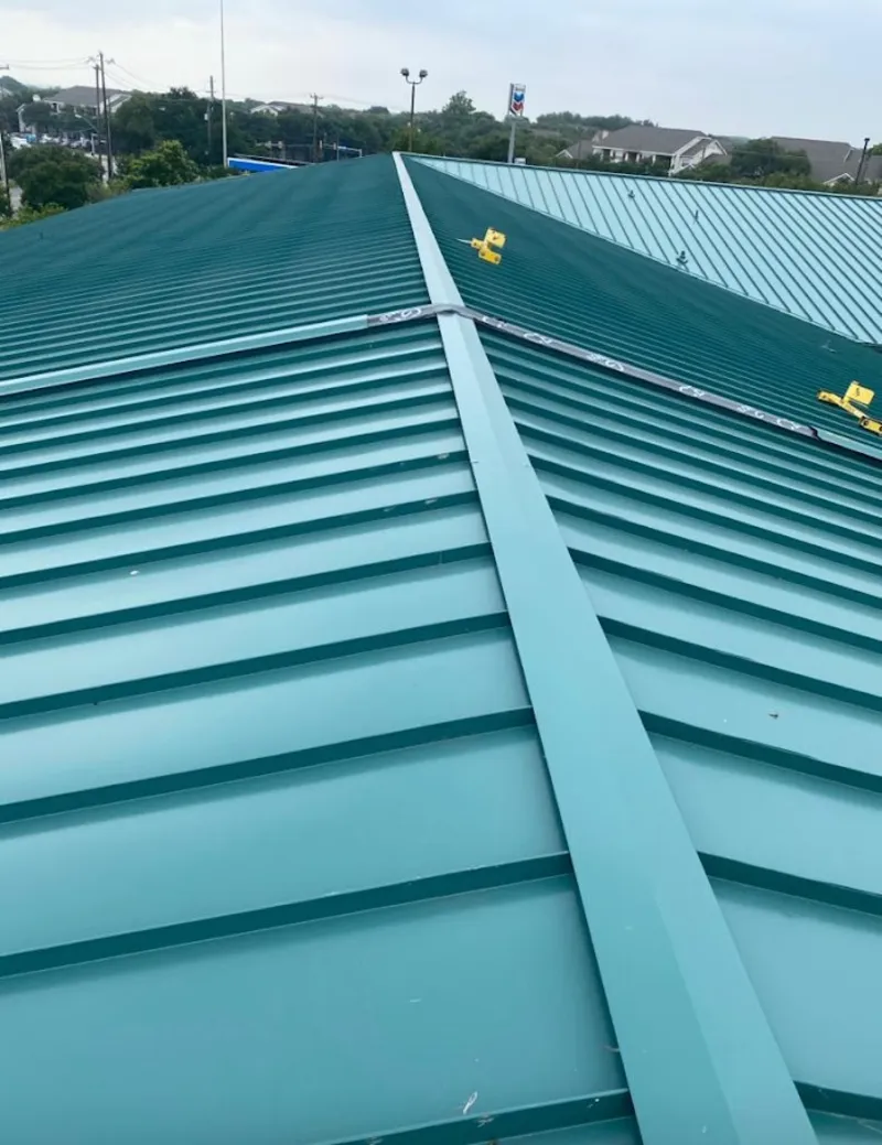 Green commercial metal roof ridge and valley for Metal Roof Repair in New Iberia